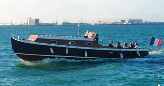 Tour de la baie sur un bateau traditionnel à moteur - Kapalouest