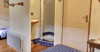 Chambre Santorine à l'étage avec douche 