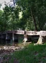 La passerelle de Romas enjambant le Trèfle (dit le pont romain)