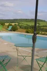 Meublés la Grange St Cybard - La piscine