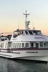 Le bateau Orazur III dans le Vieux Port au coucher du soleil